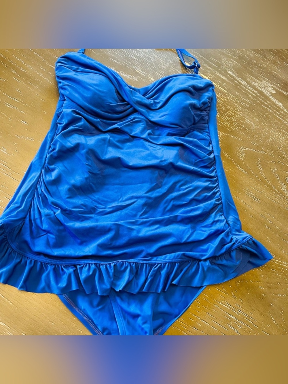 Beautiful blue one piece swimsuit.  Size 10. Very classy and cute!